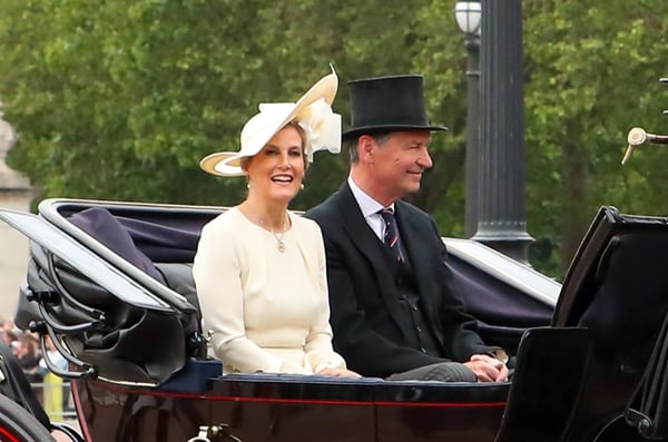 Prince Edward, Duke of Edinburgh, and Sophie, Duchess of Edinburgh, riding in a formal carriage procession during Trooping the Colour, 2023.